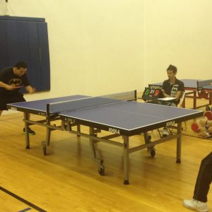 Tight match on Newport Beach table tennis