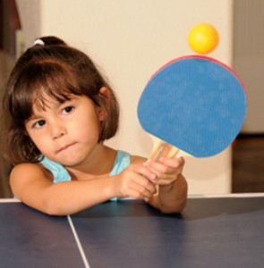 Playing table tennis with kids