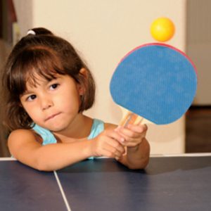 Playing table tennis with kids